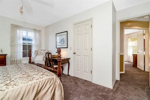 a view of outdoor space with garden and trees