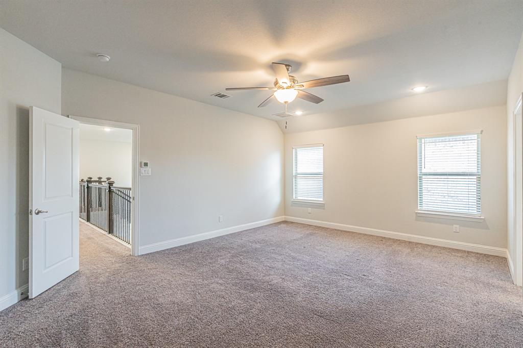 304 Adam Way Euless, TX 76040 - Photo 20 of 39 Unfurnished room with light colored carpet, a ceiling fan, and recessed lighting