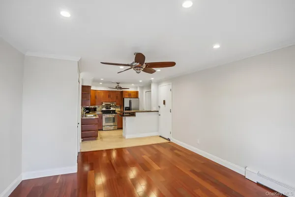 a view of a living room hardwood and wooden floor