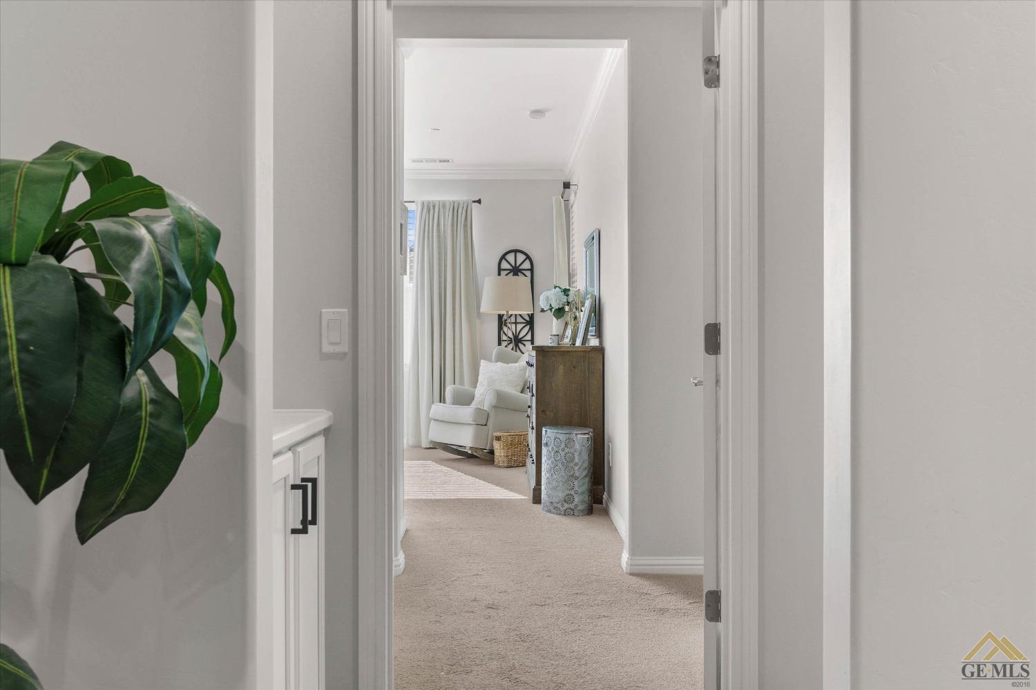 Undisclosed Address Bakersfield, CA 93311 - Photo 20 of 37 a view of a hallway with interior of the house