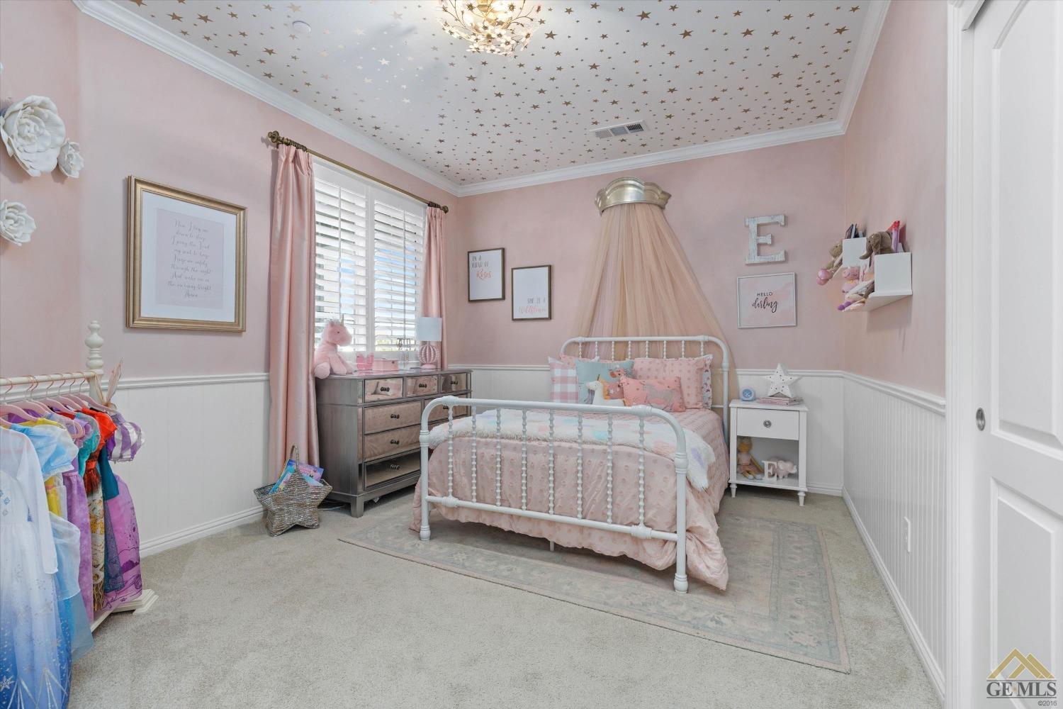 Undisclosed Address Bakersfield, CA 93311 - Photo 31 of 37 a bedroom with a bed and a window