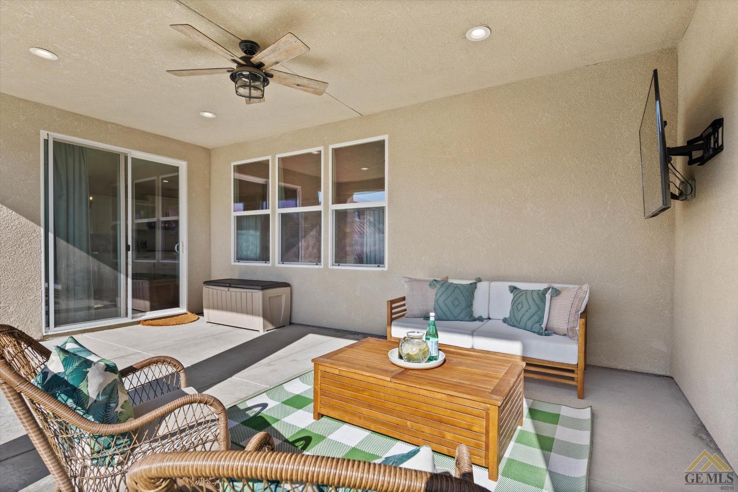 Undisclosed Address Bakersfield, CA 93311 - Photo 34 of 37 a living room with furniture and a window