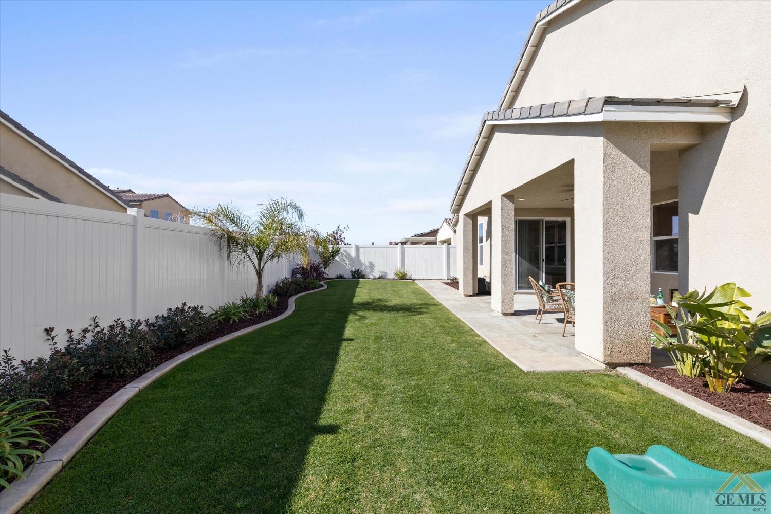 Undisclosed Address Bakersfield, CA 93311 - Photo 37 of 37 a view of a house with a yard
