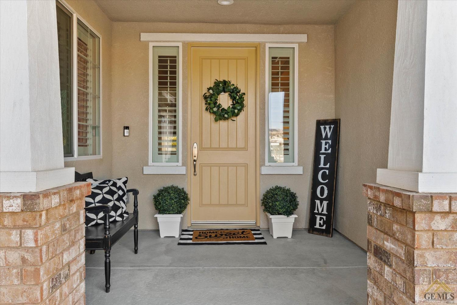 Undisclosed Address Bakersfield, CA 93311 - Photo 4 of 37 a living room with furniture and a potted plant