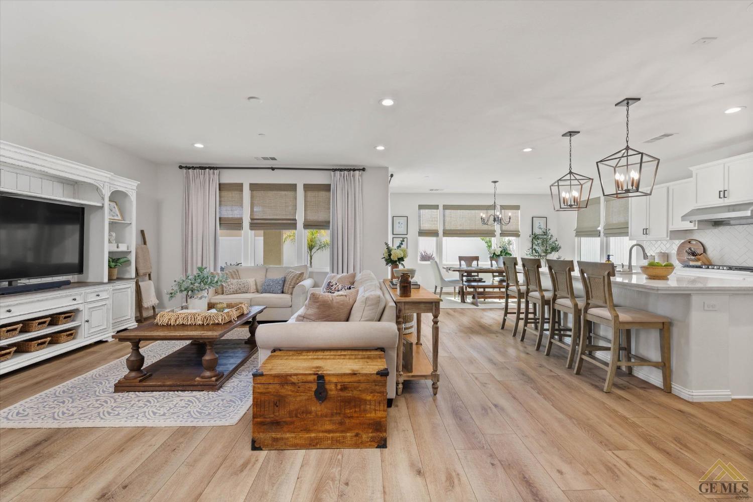 Undisclosed Address Bakersfield, CA 93311 - Photo 7 of 37 a living room with furniture and a flat screen tv