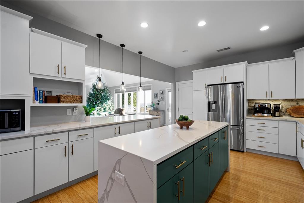 806 Harmony Road Pittsburgh, PA 15237 - Photo 12 of 48 Gleaming kitchen with Quartz counters, large island and stainless applicances.