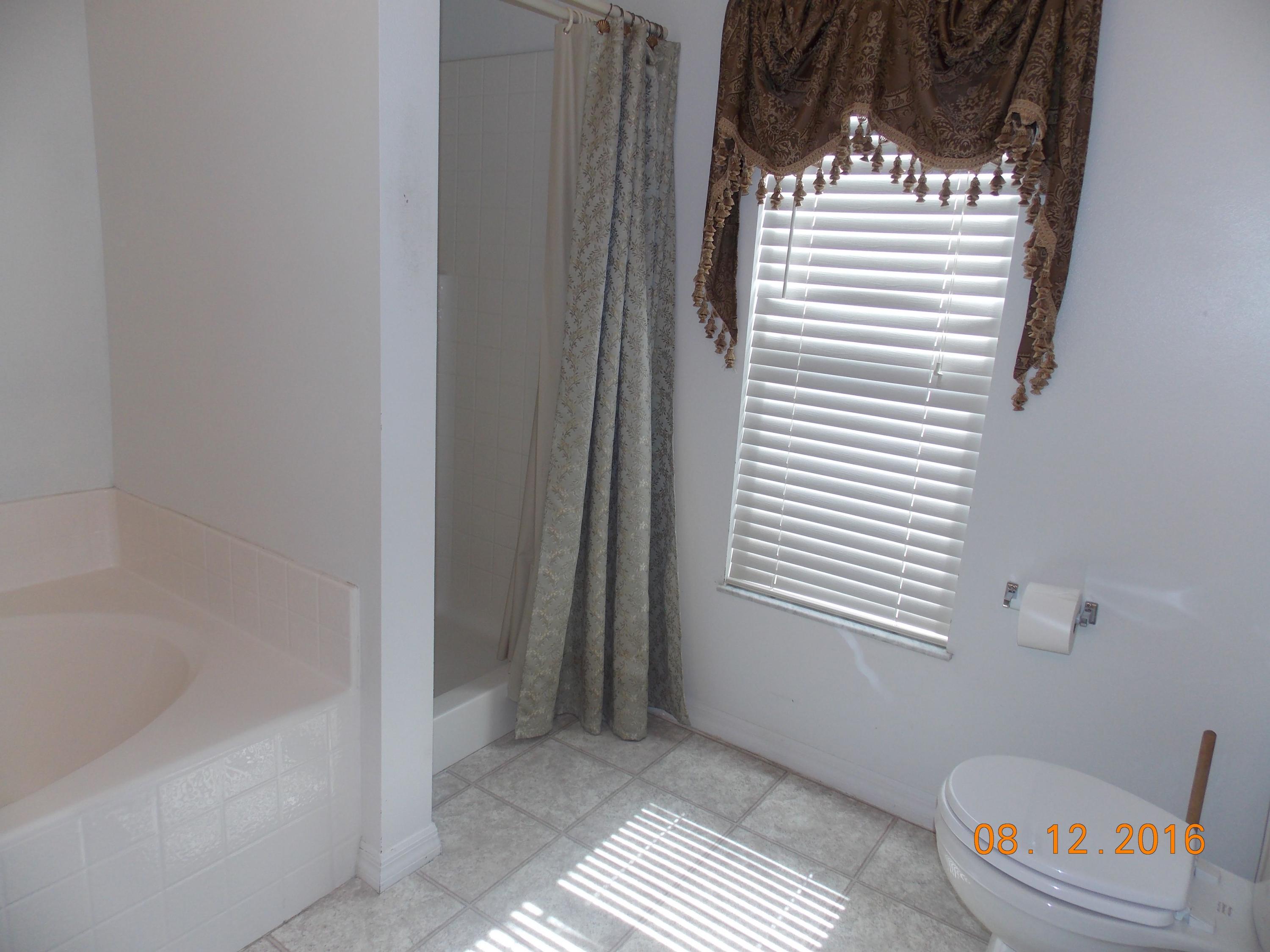 2086 Southwest Certosa Road Port St. Lucie, FL 34953 - Photo 15 of 32 Master Bath