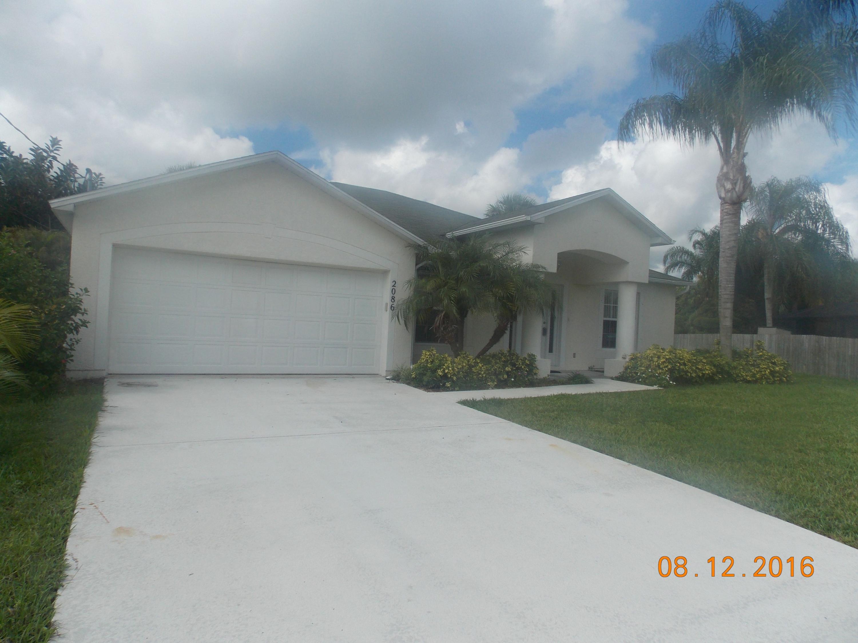 2086 Southwest Certosa Road Port St. Lucie, FL 34953 - Photo 2 of 32 Front