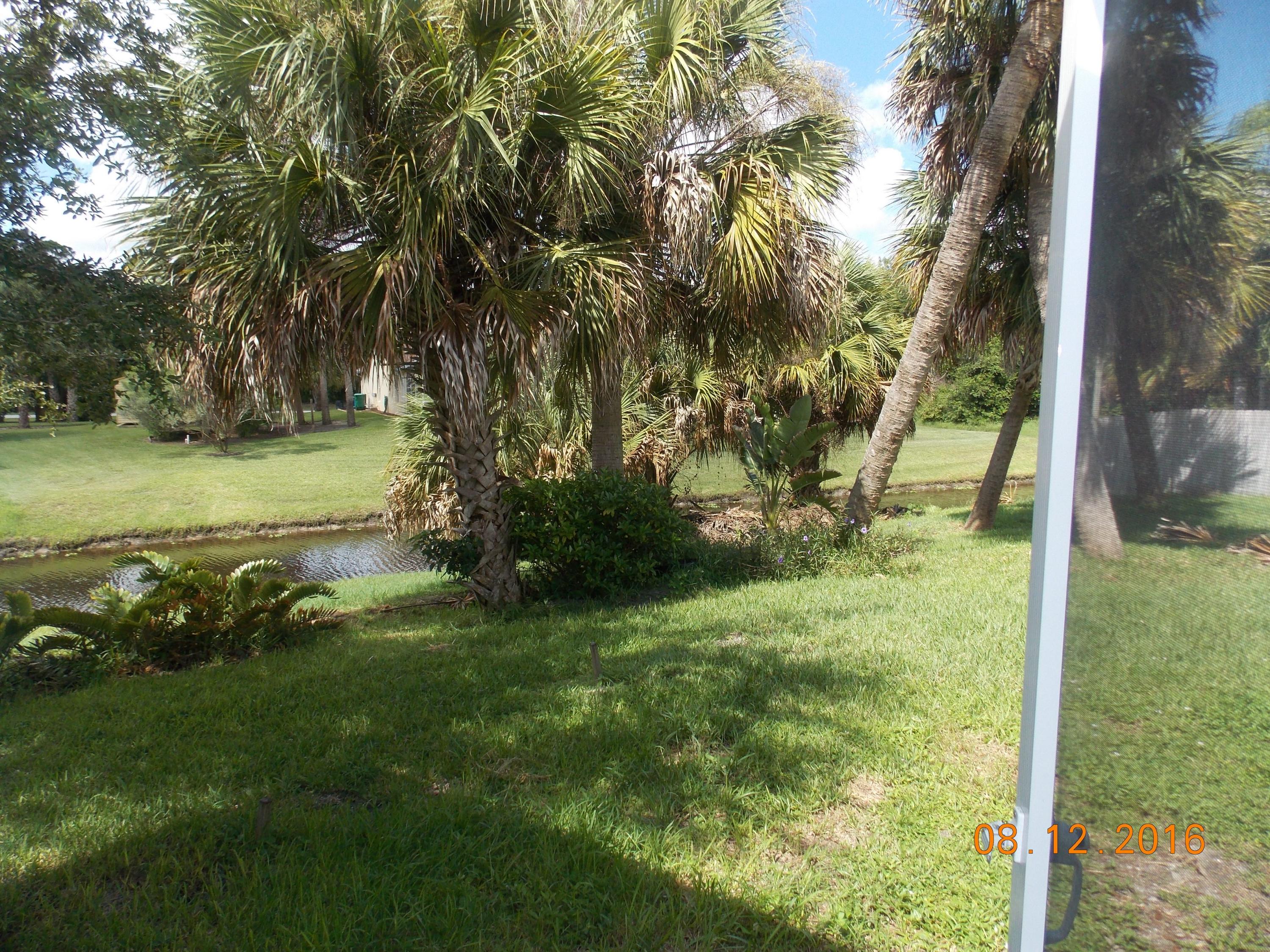2086 Southwest Certosa Road Port St. Lucie, FL 34953 - Photo 28 of 32 BackYard