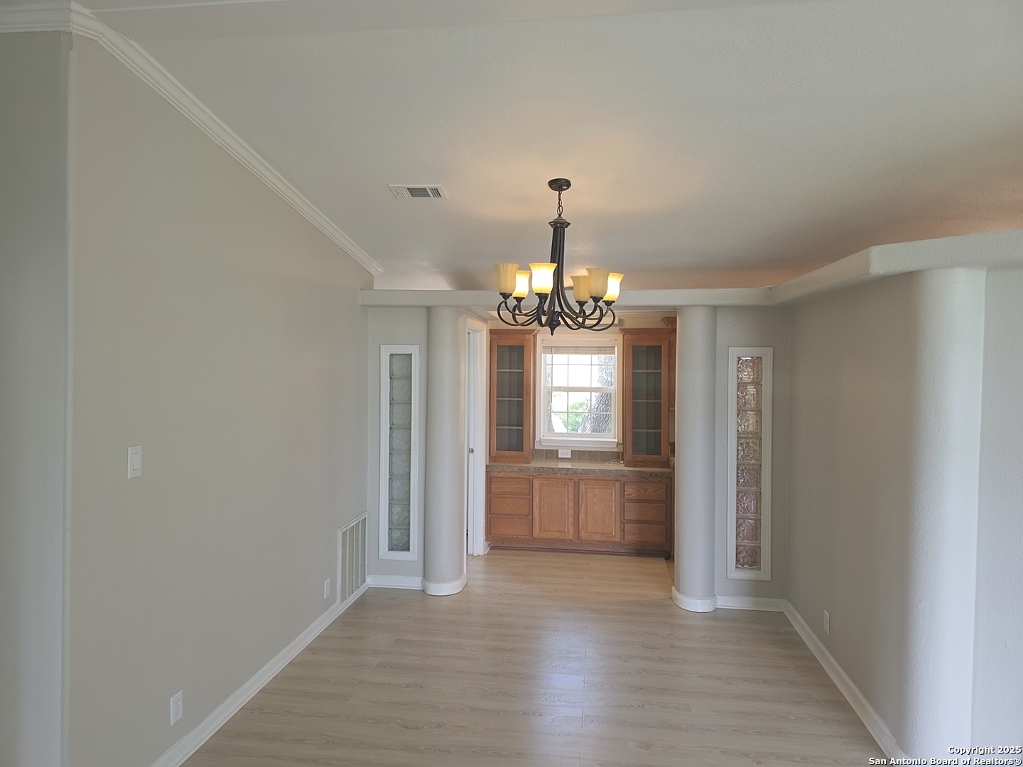 7940 County Road 279 Rio Medina, TX 78066 - Photo 14 of 33 a view of a chandelier in a room and window