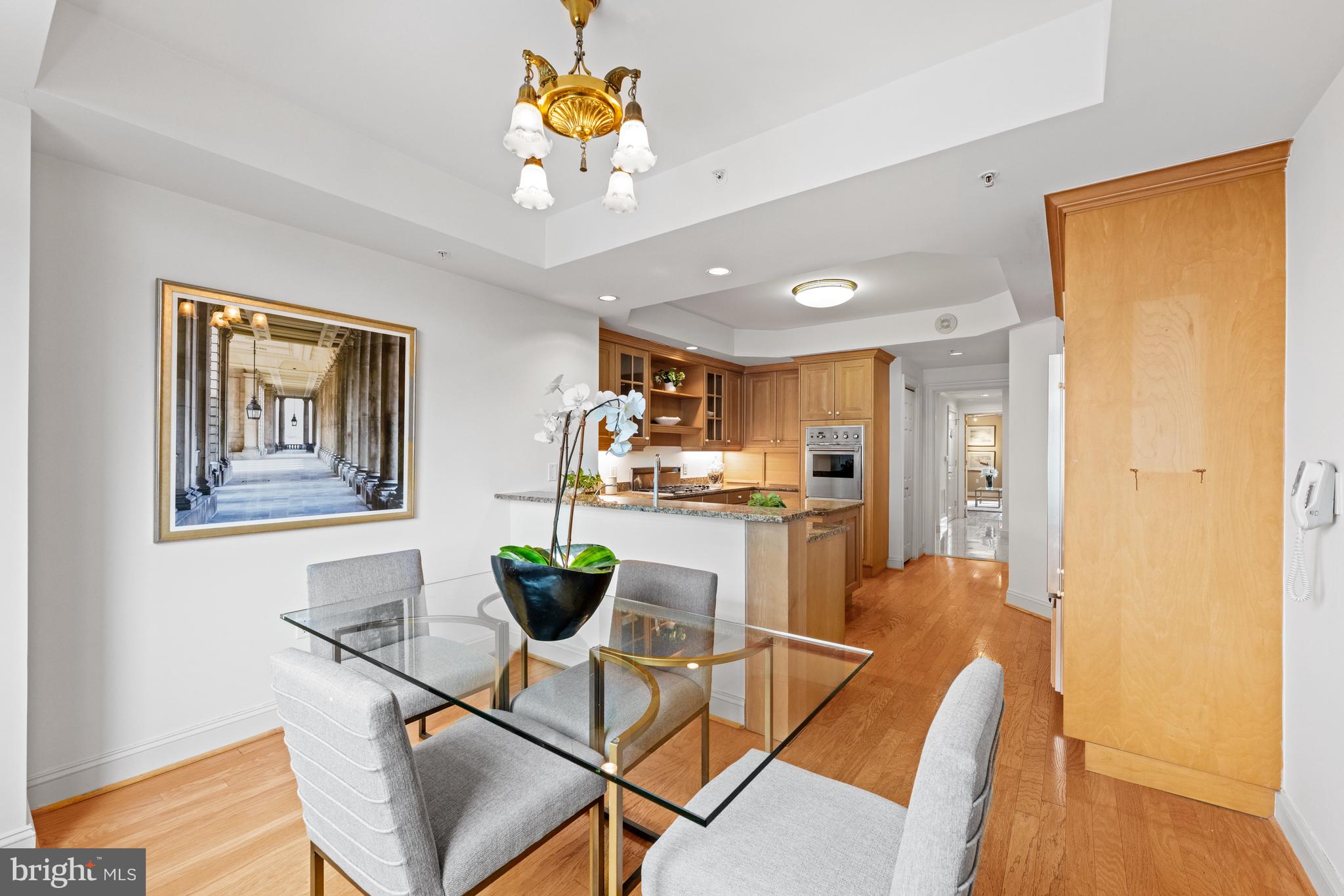5630 Wisconsin Avenue, Unit 903 Chevy Chase, MD 20815 - Photo 20 of 50 a dining room with furniture and window