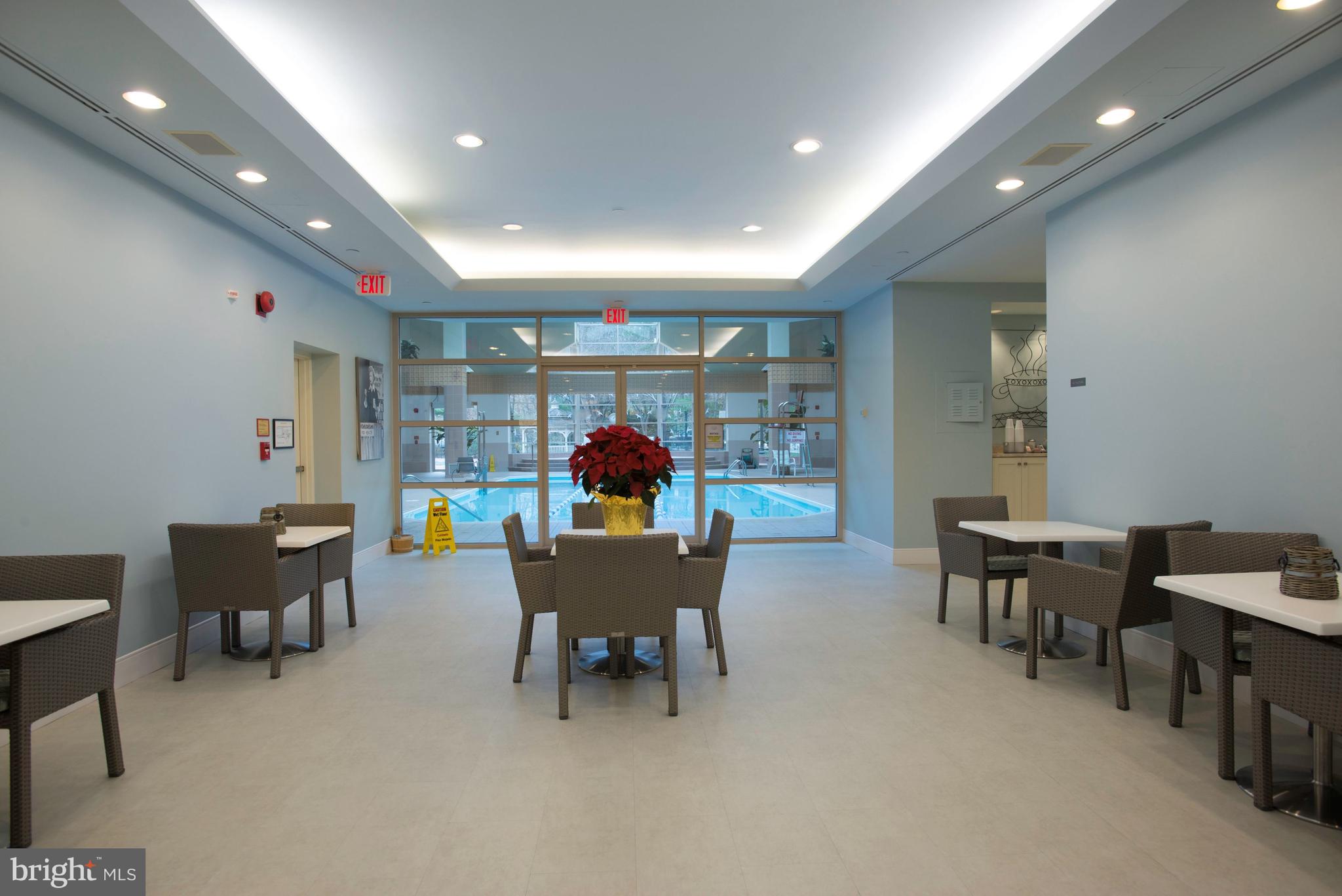 5630 Wisconsin Avenue, Unit 903 Chevy Chase, MD 20815 - Photo 36 of 50 a view of a dining room with furniture