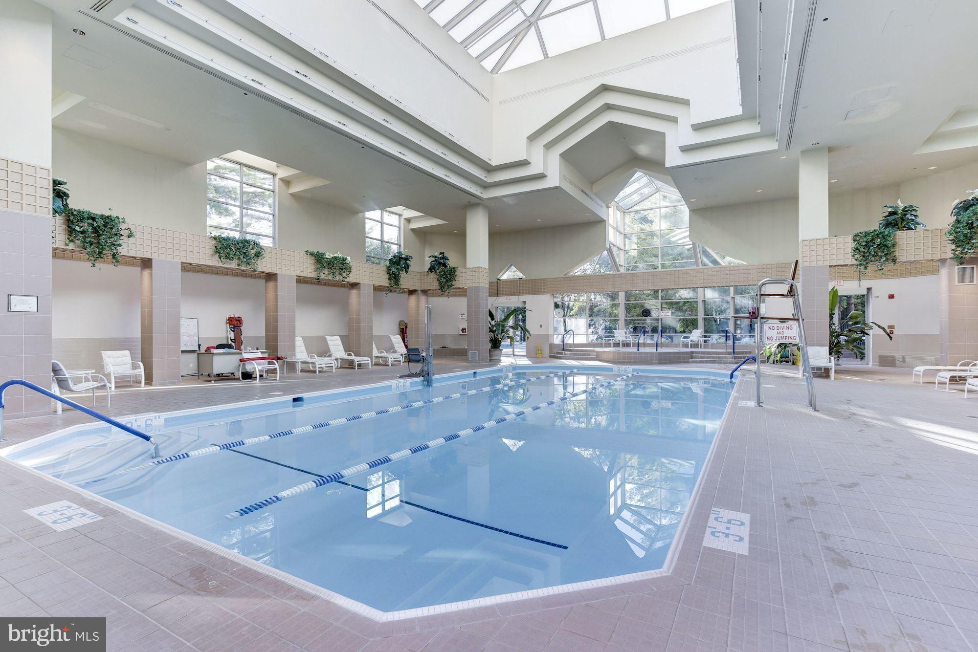 5630 Wisconsin Avenue, Unit 903 Chevy Chase, MD 20815 - Photo 37 of 50 a view of a living room and kitchen
