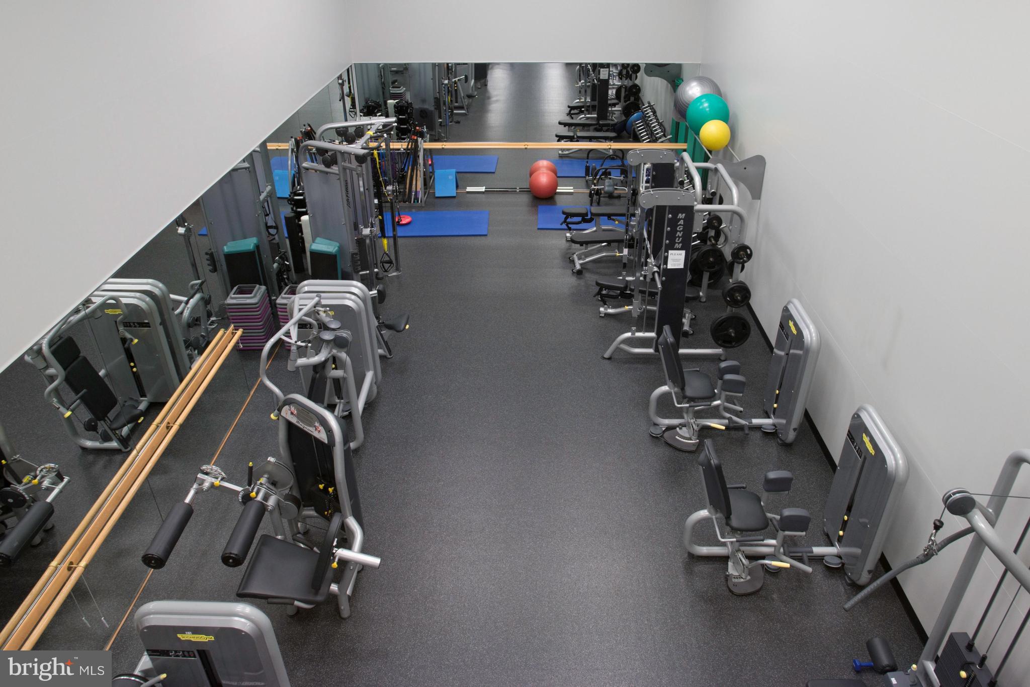 5630 Wisconsin Avenue, Unit 903 Chevy Chase, MD 20815 - Photo 40 of 50 a view of a room with gym equipment
