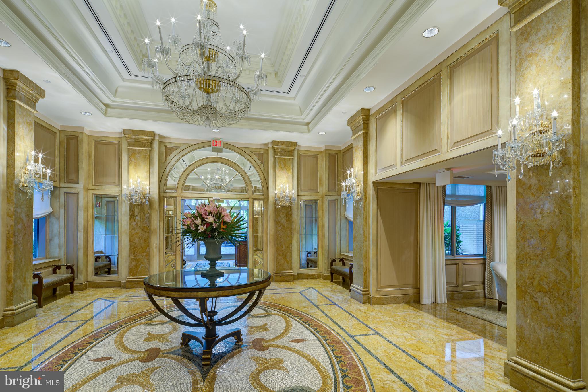 5630 Wisconsin Avenue, Unit 903 Chevy Chase, MD 20815 - Photo 4 of 50 a view of a room with furniture and chandelier