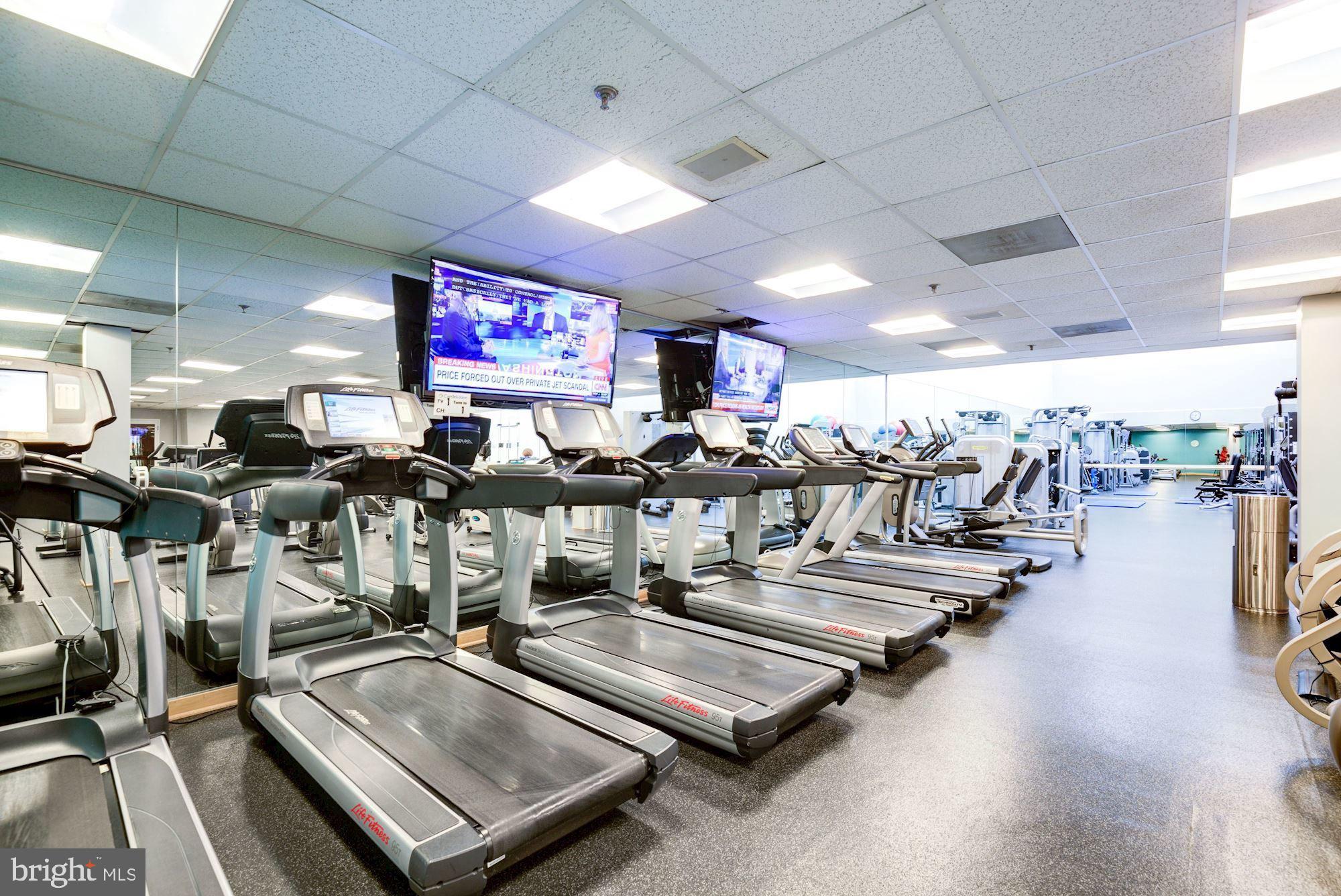 5630 Wisconsin Avenue, Unit 903 Chevy Chase, MD 20815 - Photo 41 of 50 a view of a room with gym equipment