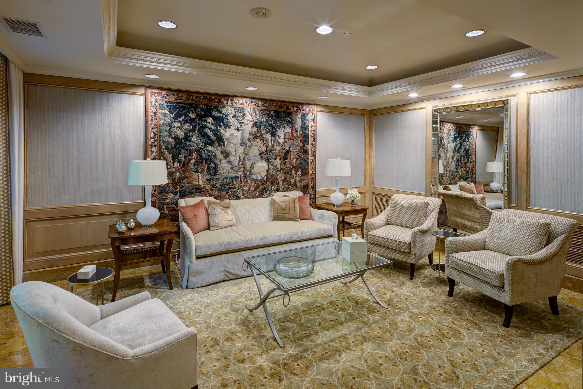 5630 Wisconsin Avenue, Unit 903 Chevy Chase, MD 20815 - Photo 5 of 50 a living room with furniture and a large window