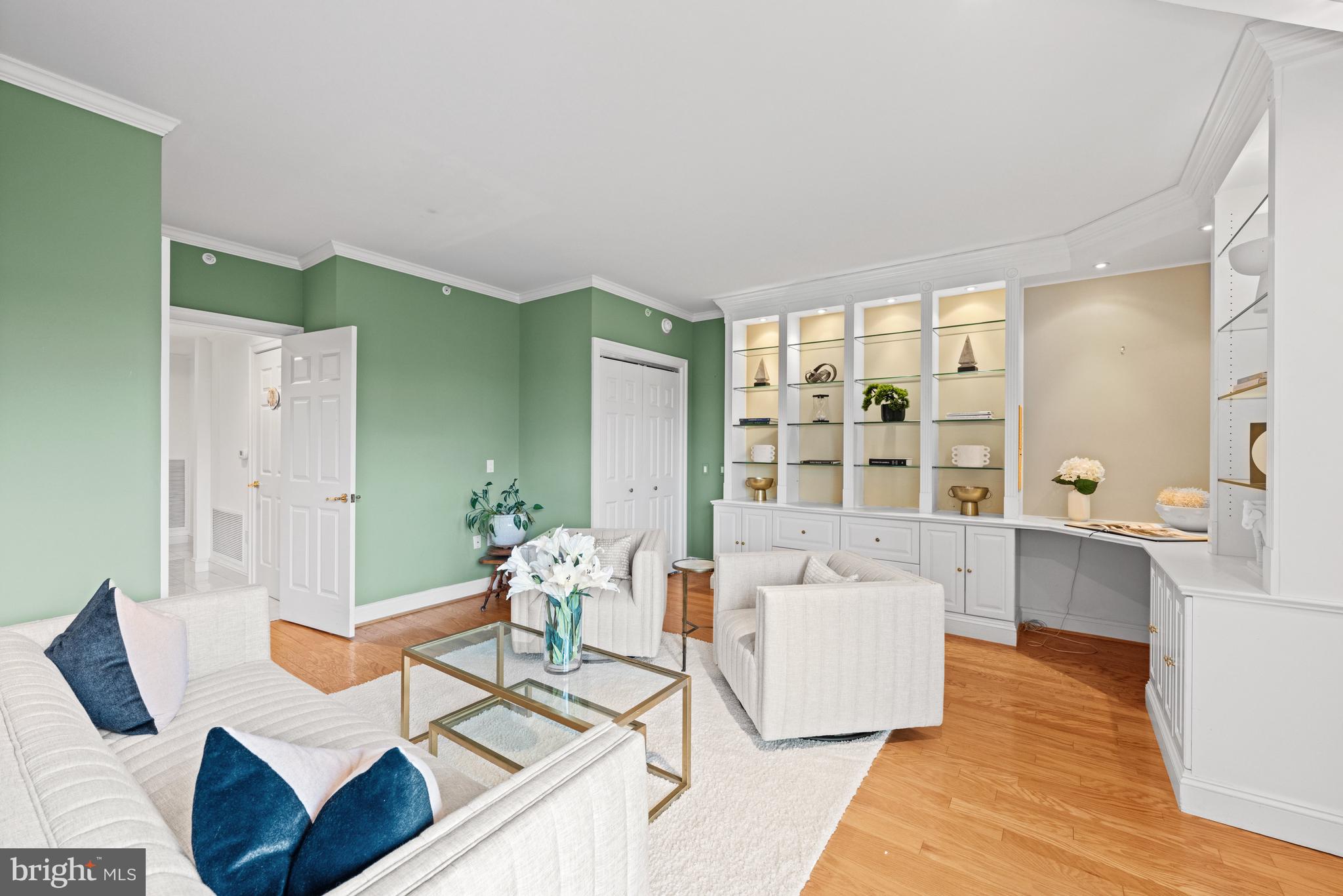 5630 Wisconsin Avenue, Unit 903 Chevy Chase, MD 20815 - Photo 9 of 50 a living room with furniture and a large window