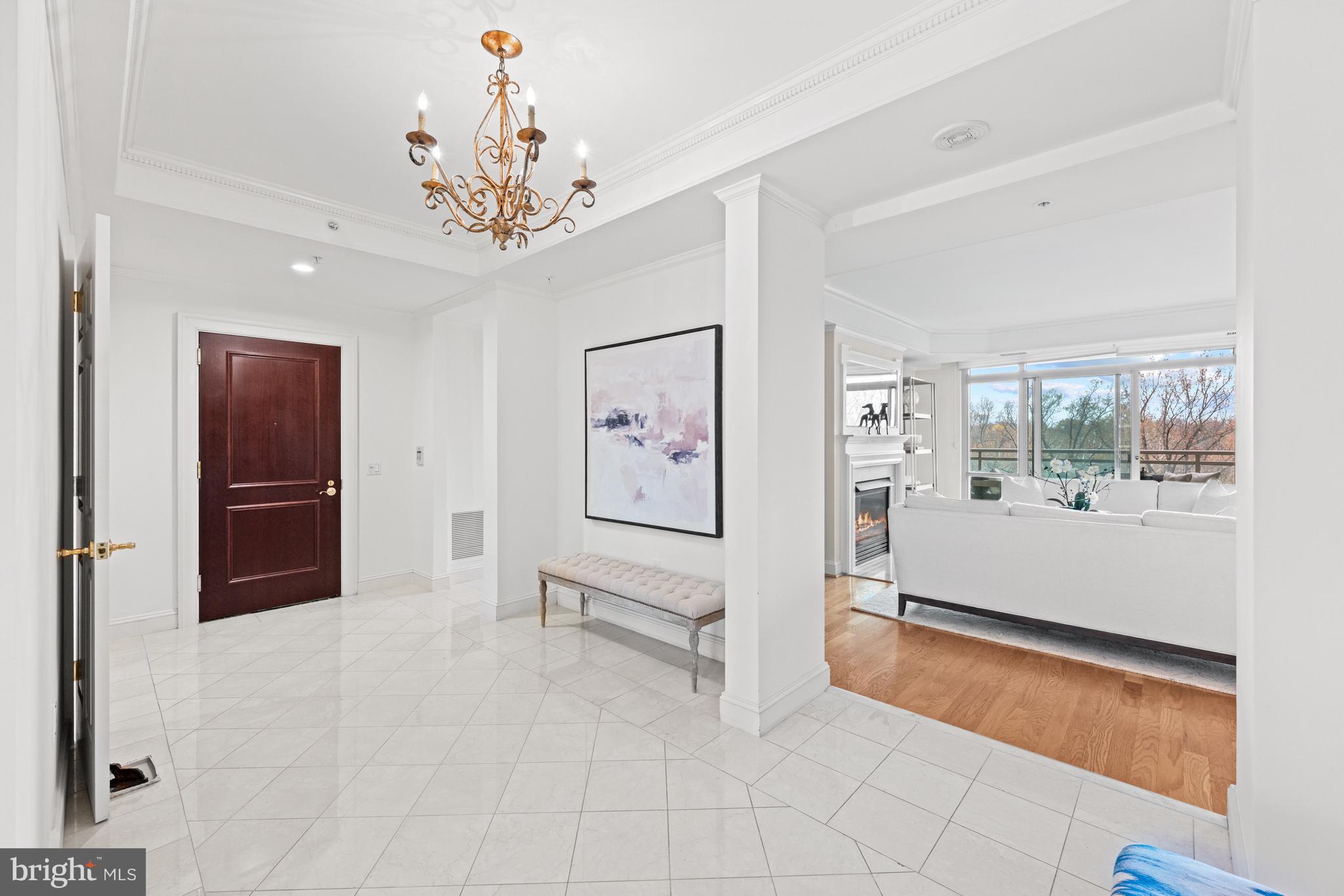 5630 Wisconsin Avenue, Unit 903 Chevy Chase, MD 20815 - Photo 10 of 50 a view of an empty room with a window