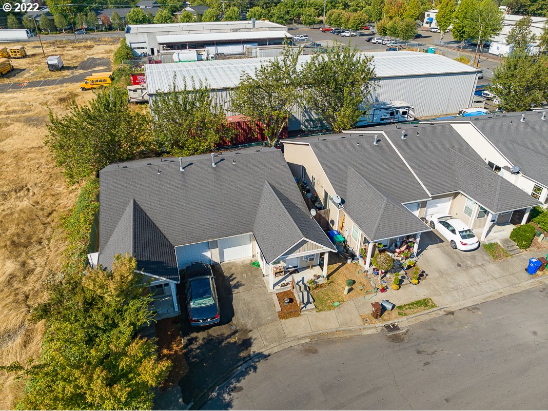 993 Southwest Junction Place Gresham, OR 97080 - Photo 22 of 27 an aerial view of a house with swimming pool and garden
