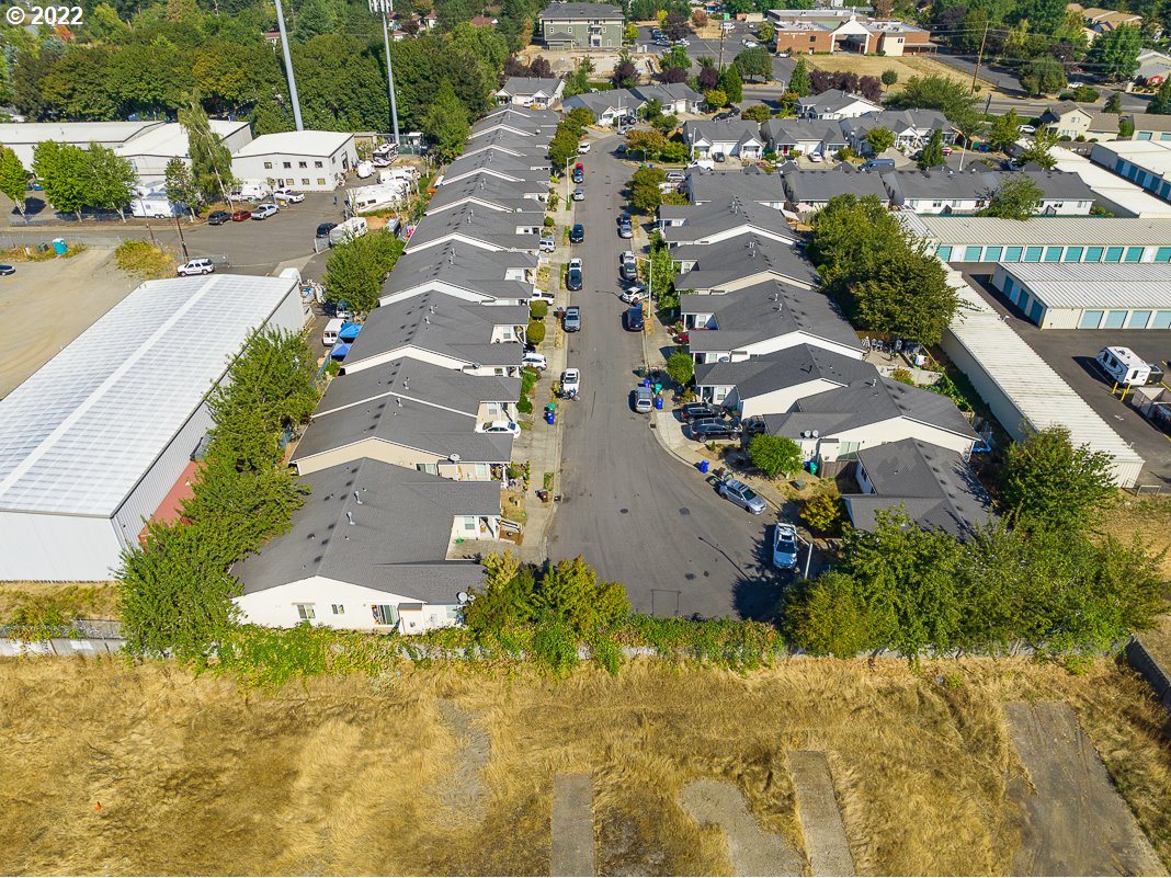 993 Southwest Junction Place Gresham, OR 97080 - Photo 23 of 27 an aerial view of residential houses with yard
