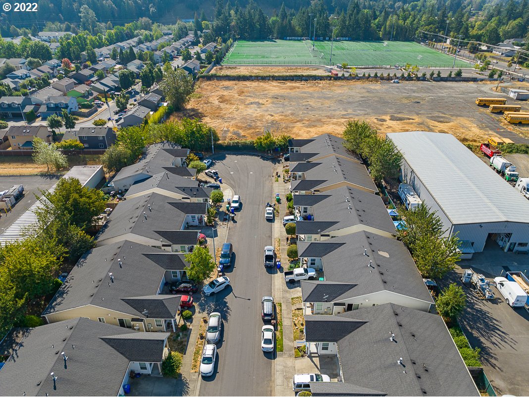 993 Southwest Junction Place Gresham, OR 97080 - Photo 24 of 27 an aerial view of residential houses with outdoor space