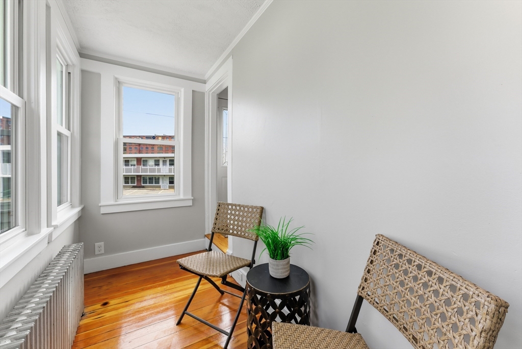 45 Meadow Street Ludlow, MA 01056 - Photo 16 of 32 a view of a workspace room with furniture and wooden floor