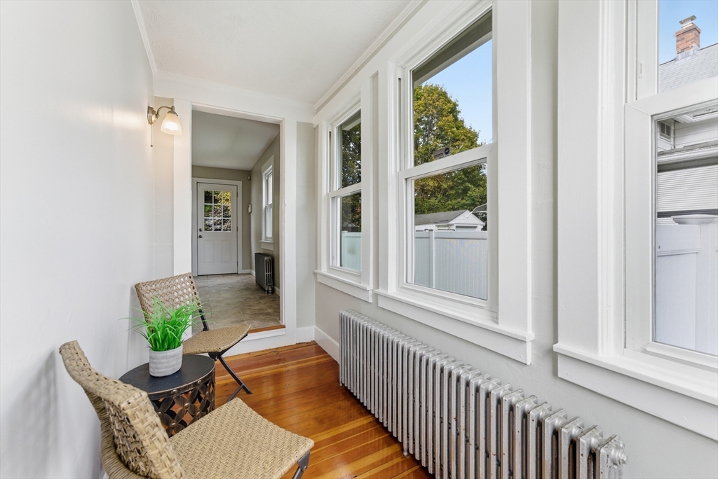 45 Meadow Street Ludlow, MA 01056 - Photo 17 of 32 a living room with furniture and a window