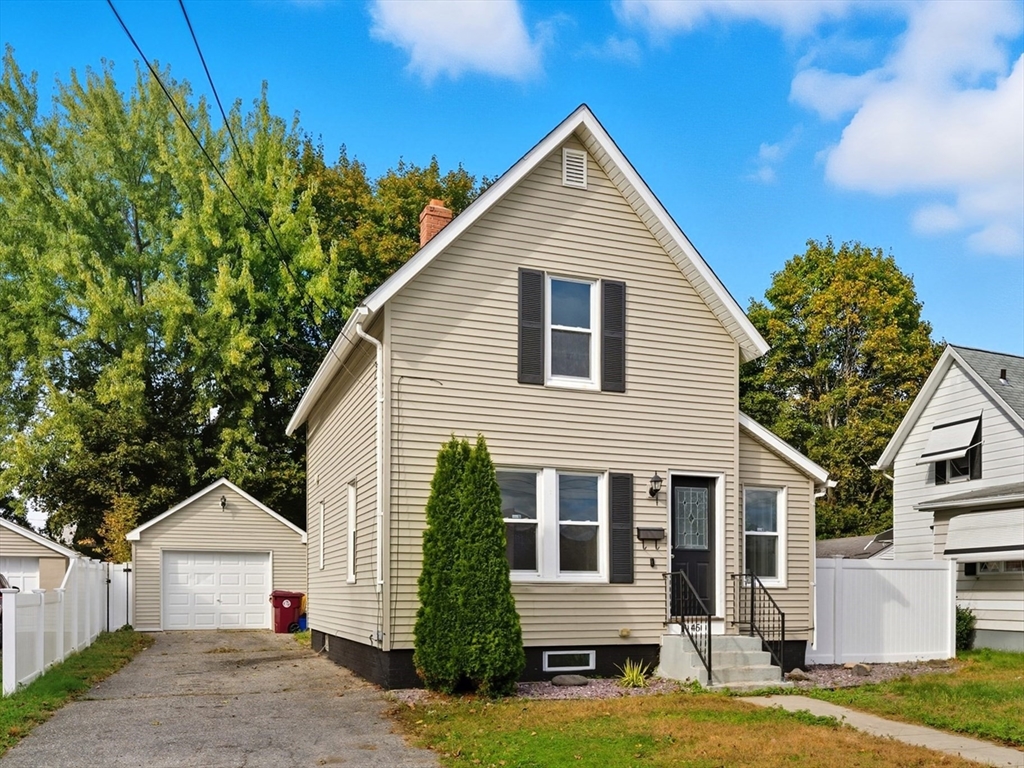 45 Meadow Street Ludlow, MA 01056 - Photo 2 of 32 a view of a house with wooden fence