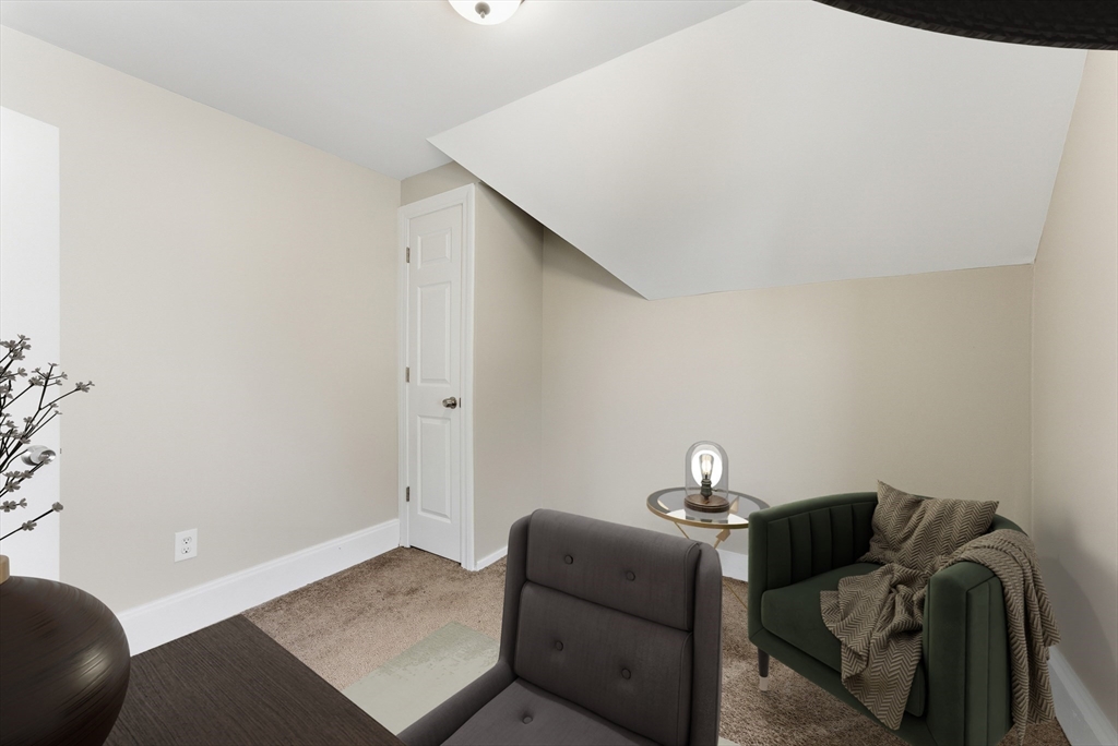 45 Meadow Street Ludlow, MA 01056 - Photo 24 of 32 a bedroom with a bed and window