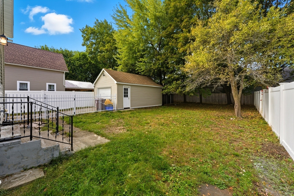 45 Meadow Street Ludlow, MA 01056 - Photo 29 of 32 a view of a house with a backyard