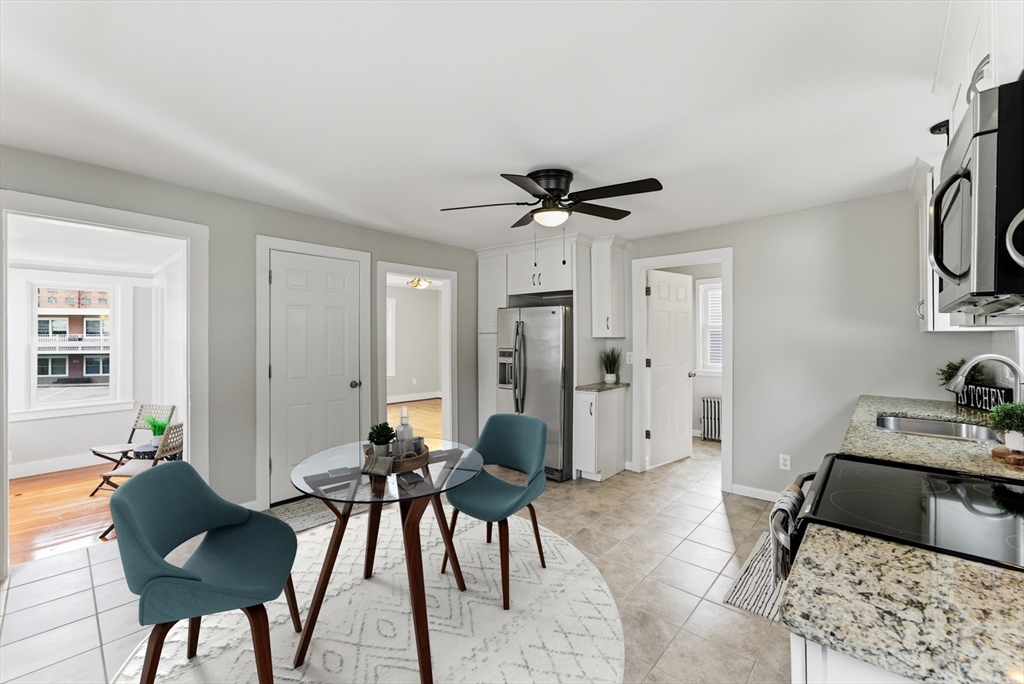45 Meadow Street Ludlow, MA 01056 - Photo 10 of 32 a living room with furniture and a window