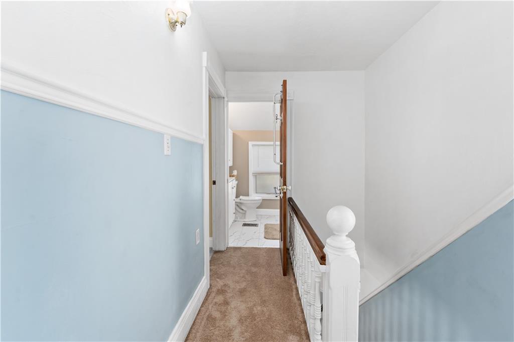 617 Maple Street Coraopolis, PA 15108 - Photo 17 of 38 a view of a bathroom from a hallway