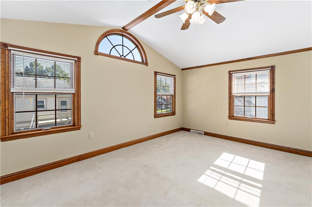 617 Maple Street Coraopolis, PA 15108 - Photo 18 of 38 an empty room with windows and ceiling fan