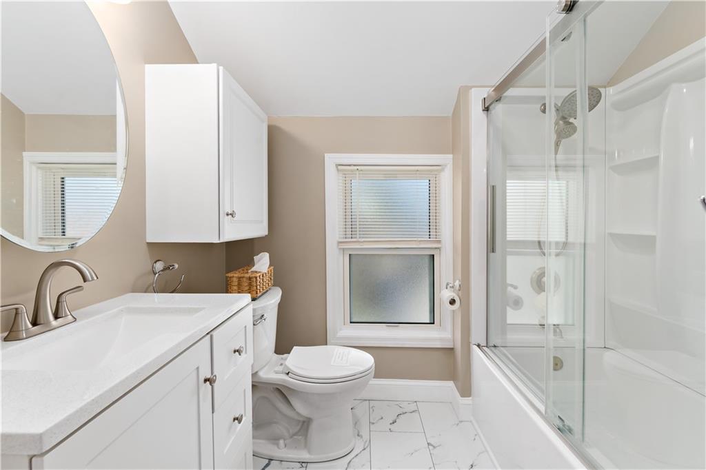 617 Maple Street Coraopolis, PA 15108 - Photo 25 of 38 a bathroom with a sink a toilet and shower