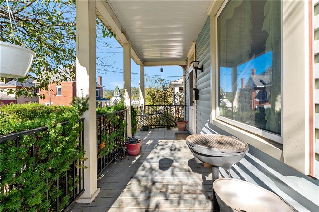 617 Maple Street Coraopolis, PA 15108 - Photo 29 of 38 a room with furniture and a potted plant