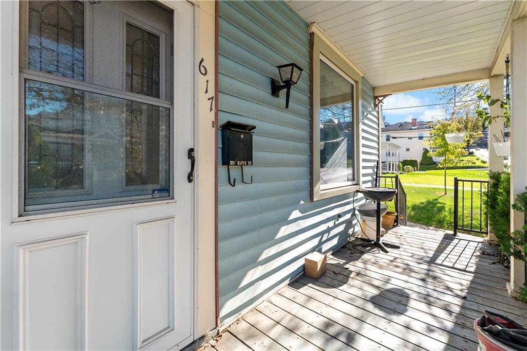 617 Maple Street Coraopolis, PA 15108 - Photo 30 of 38 a balcony with a lamp on table and chairs