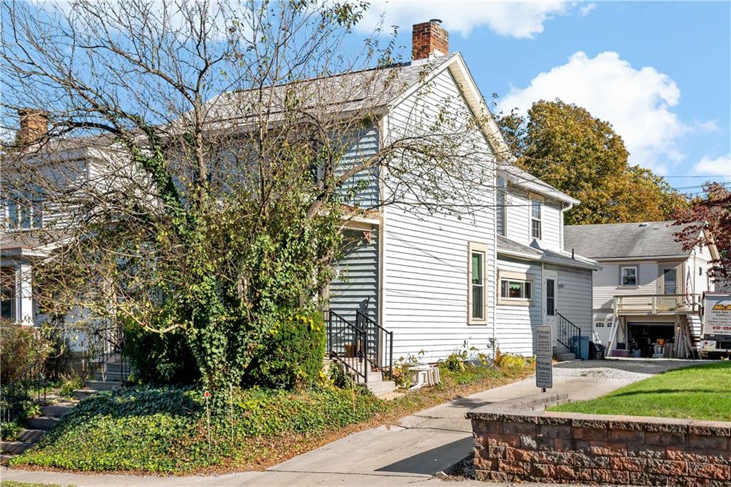 617 Maple Street Coraopolis, PA 15108 - Photo 31 of 38 a view of a house with a chairs in patio