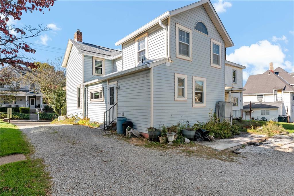 617 Maple Street Coraopolis, PA 15108 - Photo 34 of 38 a view of a house with backyard and a tree