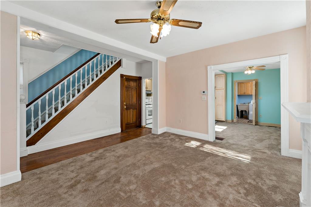 617 Maple Street Coraopolis, PA 15108 - Photo 4 of 38 a view of an empty room with staircase
