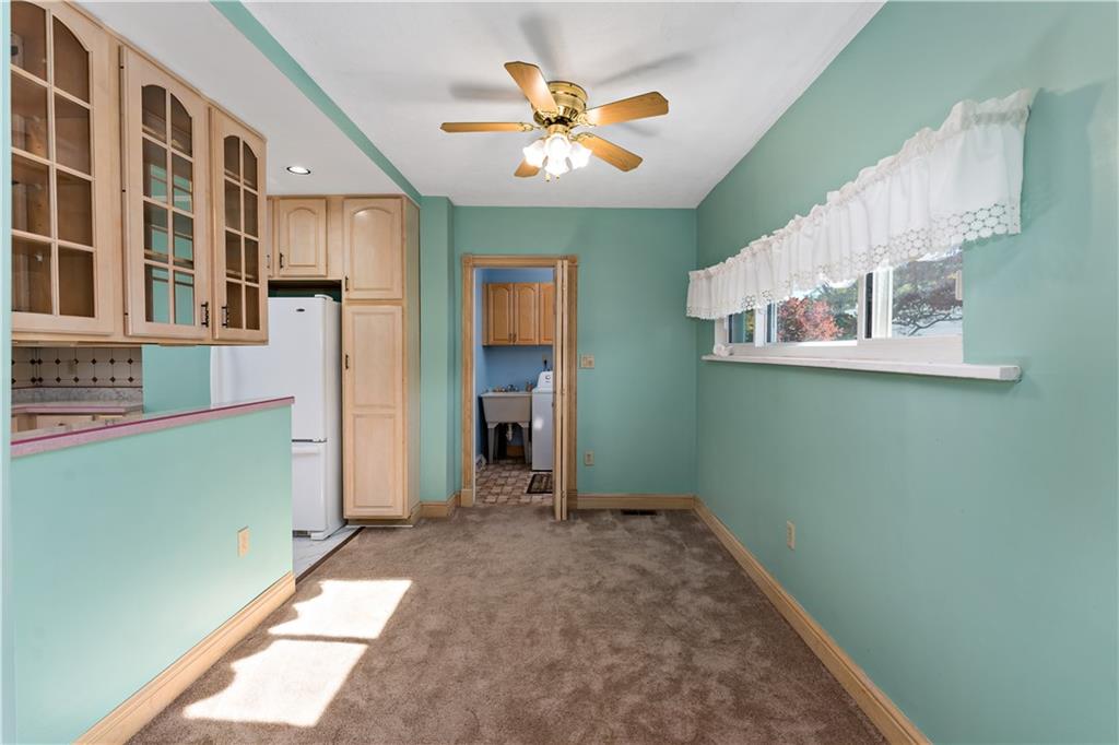 617 Maple Street Coraopolis, PA 15108 - Photo 6 of 38 a view of a hallway with a kitchen