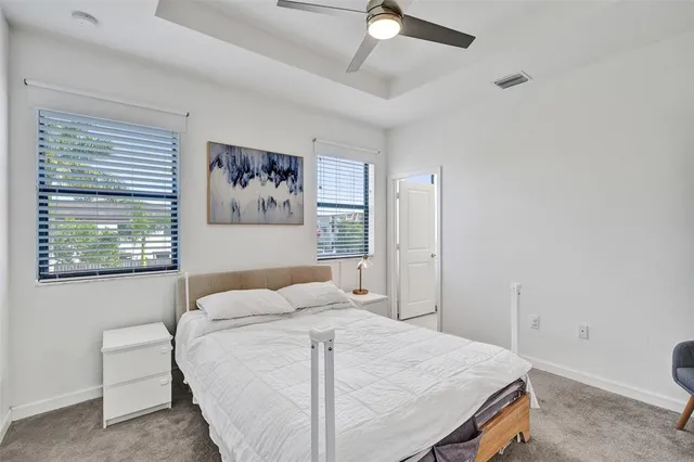 a bathroom with 2 sink and a mirror