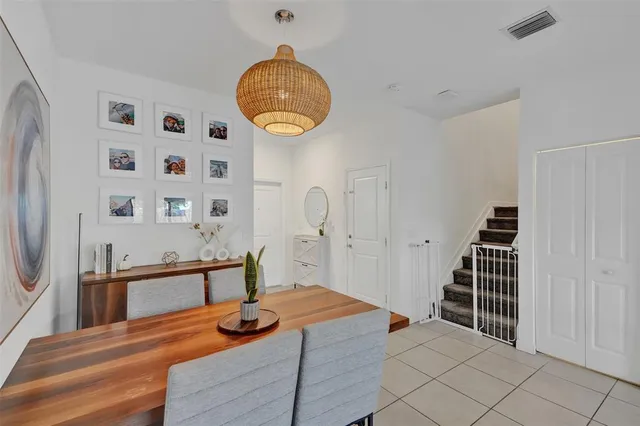 a view of hall way with furniture