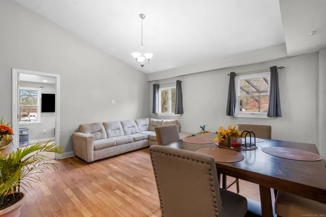 a bedroom with a bed and tv