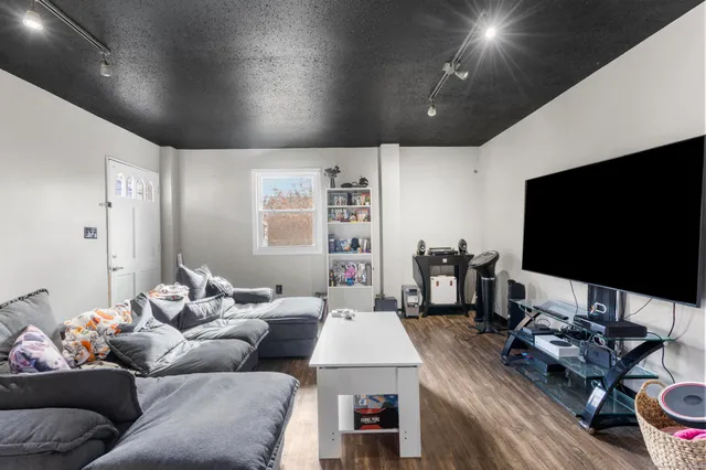 a kitchen with sink cabinets and appliances