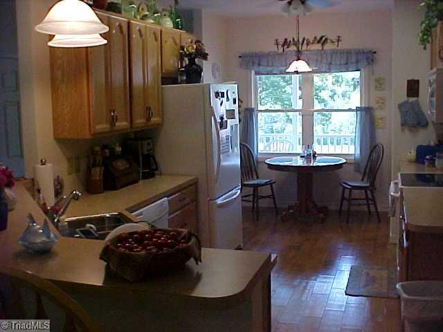 470 Old Mill Road Lowgap, NC 27024 - Photo 3 of 13 Kitchen. Great kitchen - tile throughout entry, kitchen and great room.