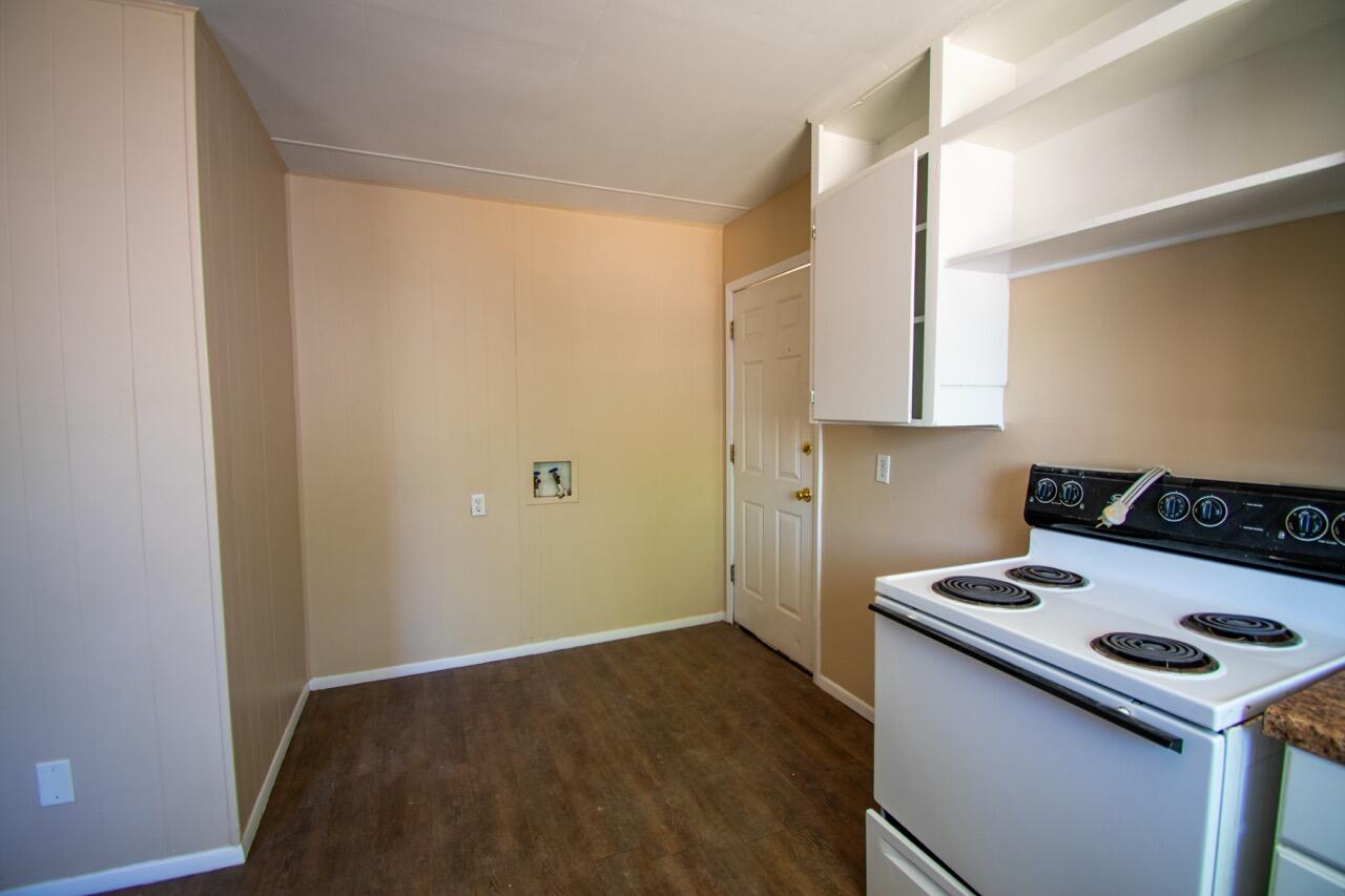 2424 27th Street Lubbock, TX 79411 - Photo 7 of 14 a utility room with washer and dryer