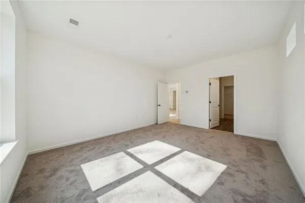 an empty room with windows