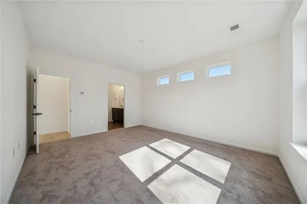 a view of a room with racks on the wall