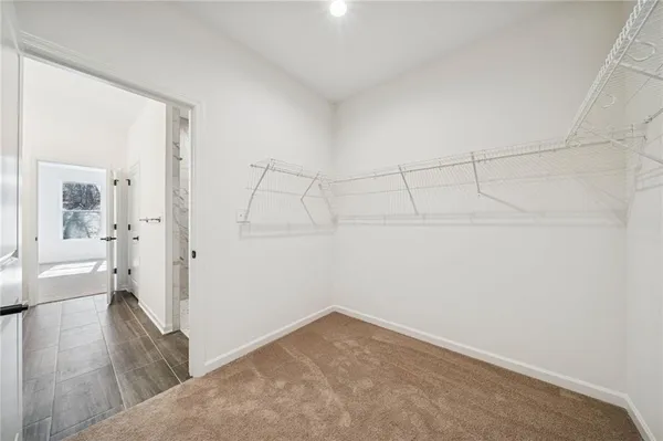 a bathroom with a double vanity sink and mirror